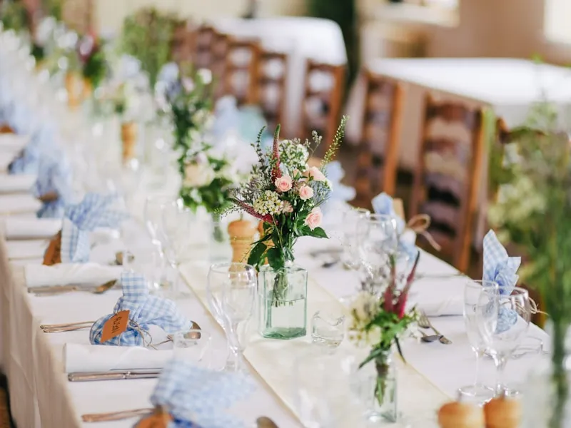 Elegantly styled banquet table set for a luxury private celebration